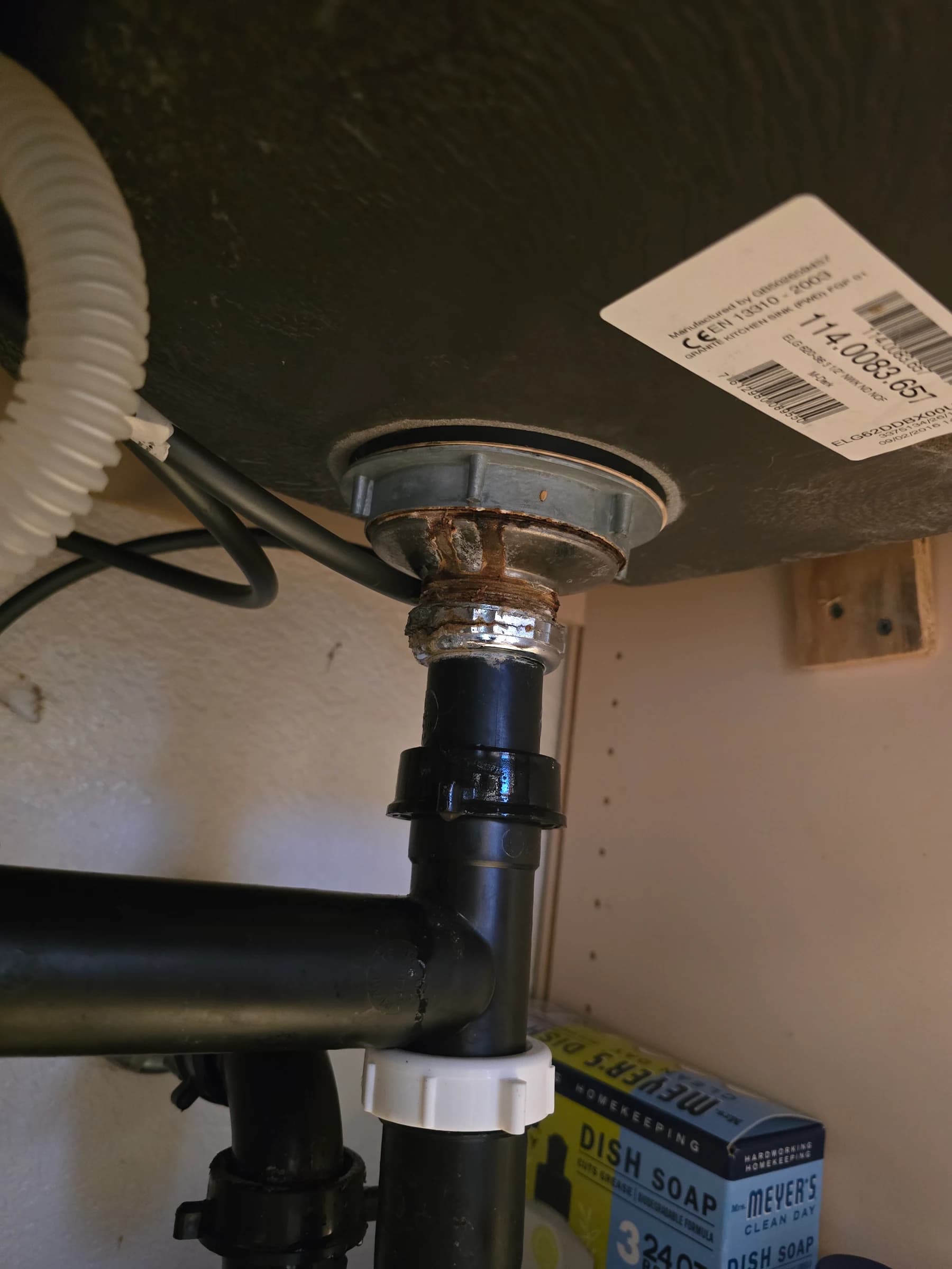 Supply lines and shutoffs replaced under a kitchen sink.