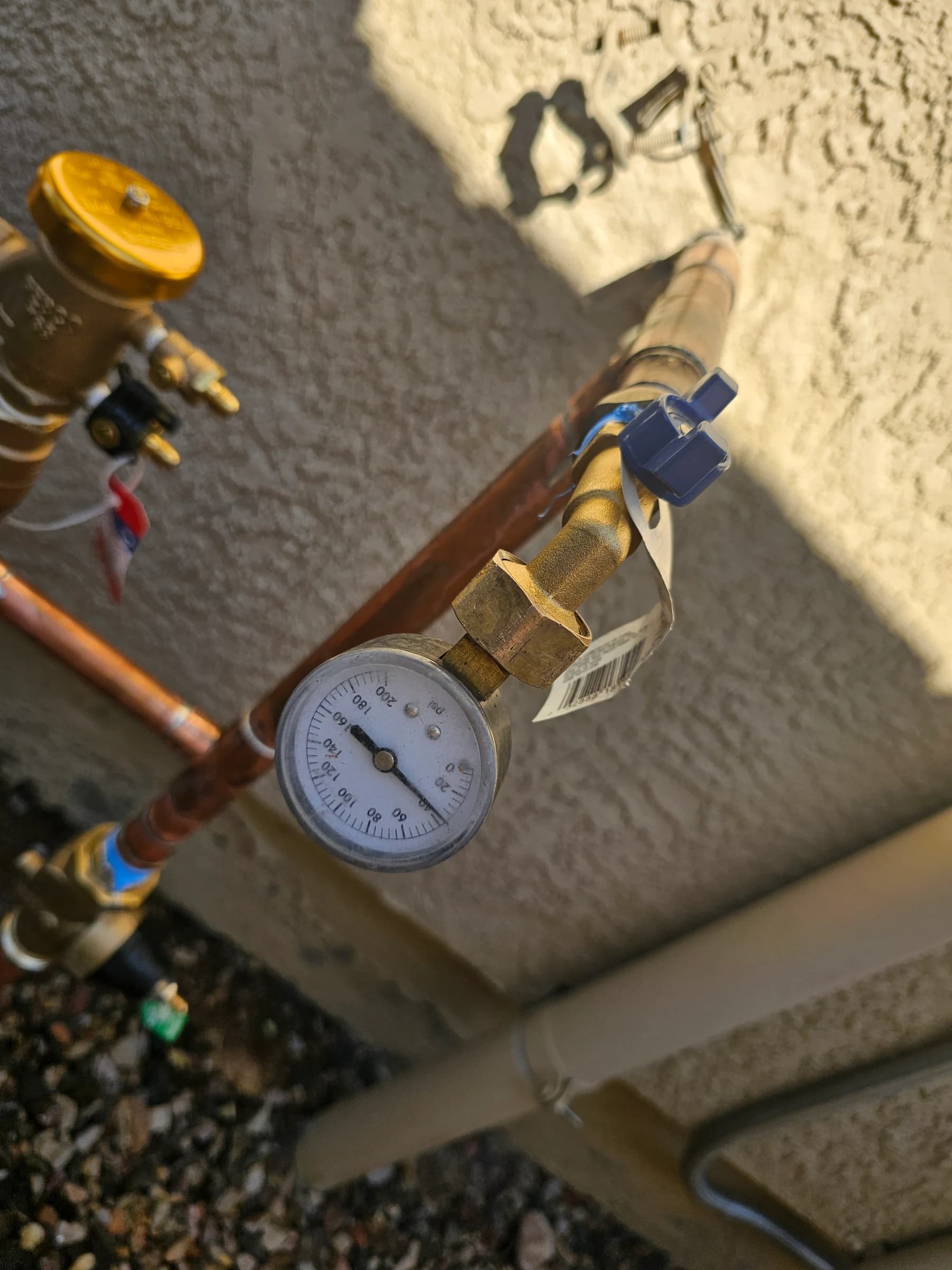 Gauge reading well above the 65 psi fixtures are built for. This is what quietly destroys them.